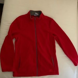 Fleece with pockets and fell zip. kids size (10-12). Never worn